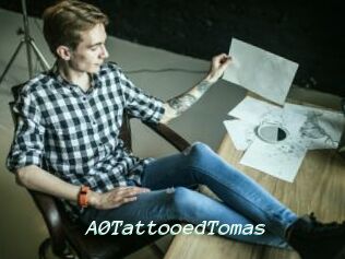 A0TattooedTomas